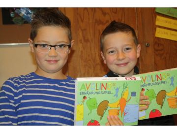 Stolze Besitzer des Avolino Ernährungsspiels